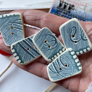 1 handmade sea pottery button, blue and white rescued transferware china, broken china crafts.