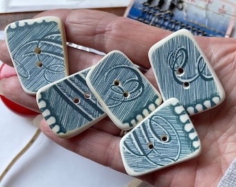 1 handmade sea pottery button, blue and white rescued transferware china, broken china crafts.