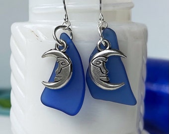 Cresent moon charms on blue glass earrings with silver plated wires, seaglass inspired handmade jewelry. Shipped in gift box.