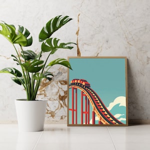 May include: A framed illustration of a red roller coaster going up a hill against a blue sky with white clouds.