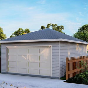 May include: A single-car garage with a white door and a gray roof. The garage is surrounded by a wooden fence and green landscaping.