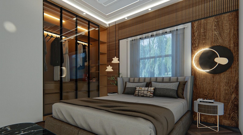 Puede incluir: Un dormitorio con una cama grande con un edred&oacute;n marr&oacute;n y una cabecera de madera. La cama est&aacute; junto a una ventana con cortinas blancas y vistas a los &aacute;rboles. Hay una mesita de noche con una l&aacute;mpara en el lado derecho de la cama. La habitaci&oacute;n tiene un dise&ntilde;o moderno con paneles de madera en las paredes y una puerta de armario de vidrio.