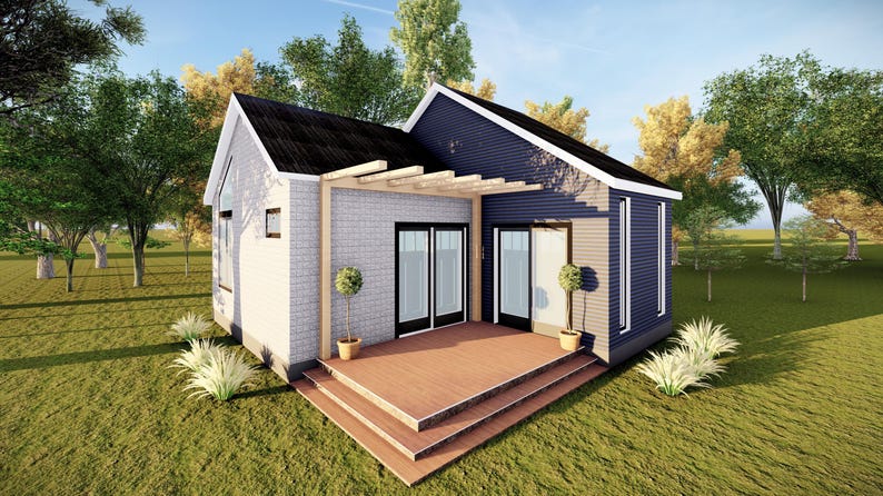 Peut inclure: Une petite maison moderne avec un toit sombre, un parement en briques blanches et un bardage bleu. La maison dispose d'une terrasse en bois et d'une pergola. Deux petits arbres en pot flanquent l'entr&eacute;e. La maison est entour&eacute;e d'herbe verte et d'arbres.