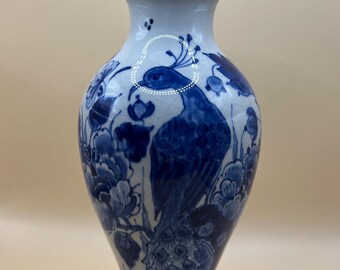 Square shaped Delft blue flower vase with peacock on porcelain