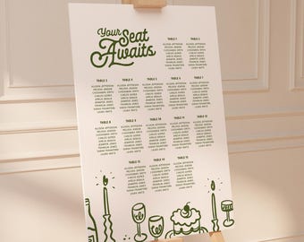May include: A white seating chart on an easel with the text "Your Seat Awaits" in green script. The chart lists names under table numbers 1-15. Green line drawings of candles, wine glasses, and a cake decorate the bottom.