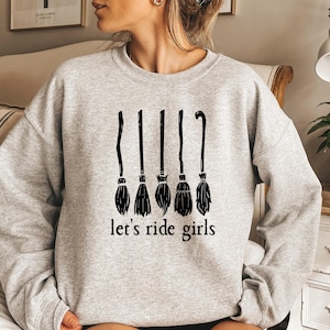Halloween Let’s Ride Girls Shirt, Funny Witch Broom T-Shirt, Girls Night Out Tee, Spooky Season Pumpkin Witch Sweatshirt