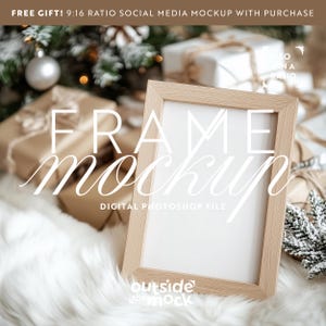 May include: A wooden frame mockup with a white background, surrounded by brown gift boxes and a white furry surface. The text "FRAME MOCKUP" is written in white on the image. The text "DIGITAL PHOTOSHOP FILE" is written in white below the frame. The text "outside the mock" is written in white below the frame.