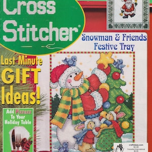 May include: The Cross Stitcher magazine cover, December 2001 issue, features a cross-stitch design of a snowman, rabbits, and a Christmas tree. The cover also includes text that reads "Last Minute Gift Ideas!" and "America's BEST Cross-Stitch Magazine".