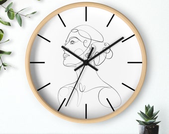 Horloge murale moderne portrait dessin au trait