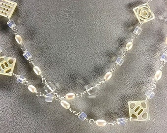 Necklace of Carved Mother of Pearl and Freshwater Pearls