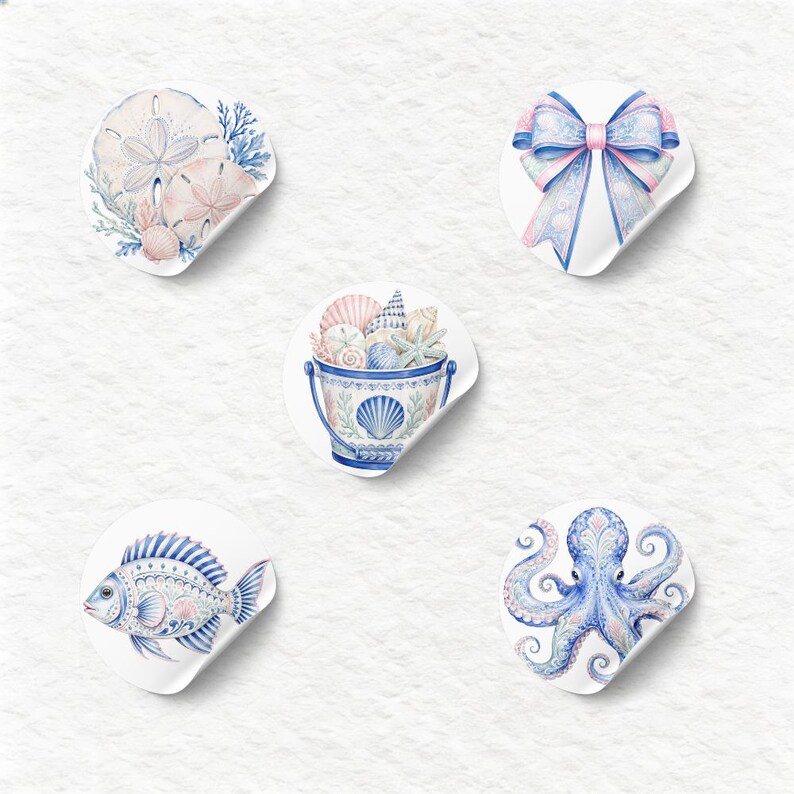 A collection of soft watercolor coastal elements, including a striped swimsuit, a bucket of seashells, nautical ropes, a lighthouse, a pelican, and a sand dollar arrangement, all rendered in serene blues, pinks, and white. This image captures the essence of a tranquil beach vacation.