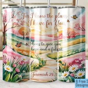 May include: Three stainless steel tumblers with a watercolour design of a path through a field of flowers and butterflies. The tumblers feature the quote "For I know the plans I have for you. Plans to give you hope and a future." and the scripture reference "Jeremiah 29:11".