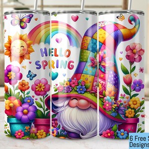 May include: Three stainless steel tumblers with colorful spring-themed designs. The designs feature a rainbow, flowers, butterflies, a gnome with a patchwork hat, and the text "Hello Spring".