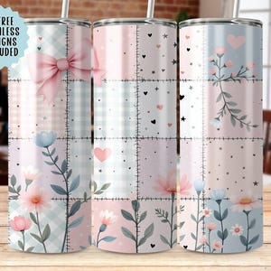 May include: Three stainless steel tumblers with floral and bow designs. Each tumbler features a patchwork pattern with pink, blue, and white squares. The designs include flowers, hearts, and a bow. The text "6 FREE SEAMLESS DESIGNS INCLUDED" is visible.