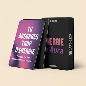 May include: A 56-card deck in a black box. The box and cards feature the words "Energie & Aura" and "Tu Absorbes Trop D'Énergie" in white and pink. The card design has a gradient purple background.