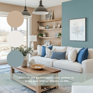 Puede incluir: Una inspiraci&oacute;n de dise&ntilde;o de interiores para una sala de estar con un sof&aacute; blanco con almohadas azules y blancas, una mesa de caf&eacute; de madera y una pared pintada de azul claro. La pared presenta una impresi&oacute;n enmarcada de una escena de invierno. La imagen tambi&eacute;n incluye una paleta de colores beige, blanco y azul claro.