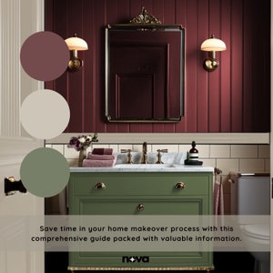 May include: A bathroom vanity with a green cabinet, white countertop, and gold fixtures. The walls are a deep burgundy color with white trim. The vanity has two drawers and a single sink. The bathroom also features a white tiled floor and a white toilet.