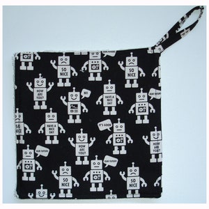 May include: A black fabric square with a white robot pattern and a loop handle. The robots have speech bubbles saying "How are you?", "Have a nice day", and "So nice". The fabric is machine washable.