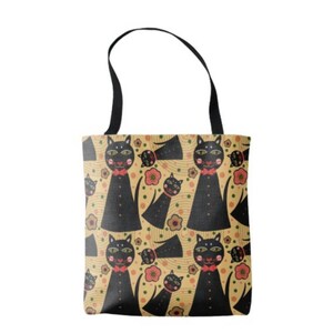 May include: A beige tote bag with a black cat pattern. The cats are wearing red bow ties and have green eyes. The background is a light beige with green and brown swirls.