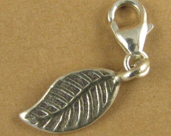 Curvy leaf clip-on charm.  Solid fine and sterling silver 925.