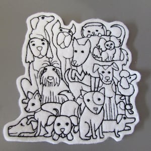 May include: A white felt patch with a black outline design of numerous dog breeds. The dogs are closely arranged, showcasing a variety of shapes and sizes. The patch has an irregular, organic shape.