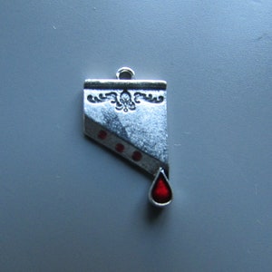 Charm tibétain guillotine