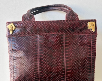 Burgundy Snakeskin Top Handled Clutch