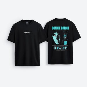 Camiseta unisex con estampado frontal y posterior de la icónica película Donnie Darko, estilo terror.