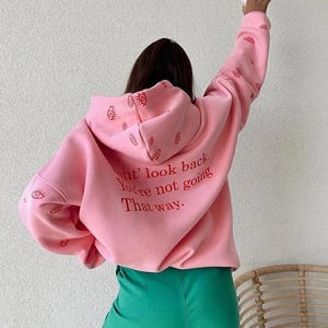 Sudadera con capucha retro vintage rosa con símbolo de ojo, manga minimalista, estampado en la espalda y gran tamaño