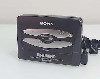 Reproductor de casetes Walkman Sony WM-EX570: reproductor de casetes portátil Sony vintage de los 90, con graves potentes, auriculares originales con control remoto y en perfecto funcionamiento.