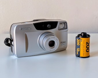 Cámara de película vintage Canon Prima Zoom 65 | En perfecto estado de funcionamiento | Probada | Con caja, estuche y manual | Cámara compacta de 35 mm