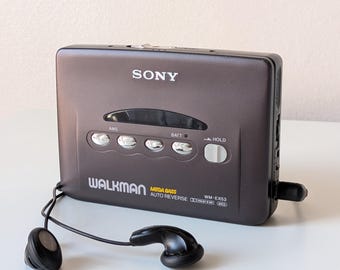 Reproductor de casetes Sony Walkman WM-EX53 - Funciona perfectamente - Correa nueva - Revisado - Estuche y auriculares originales