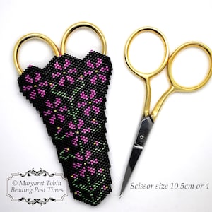 May include: Gold-handled scissors with a black beaded sheath. The sheath is decorated with pink and green floral patterns. The scissors measure 10.5 cm in length. The image also includes the text "Margaret Tobin Beading Past Times."
