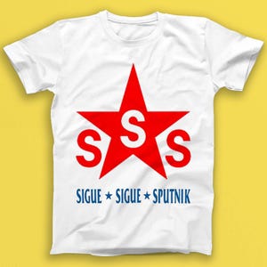 May include: White t-shirt featuring a red star with the letters "SSS" inside. Below the star is the text "SIGUE * SIGUE * SPUTNIK" in blue.