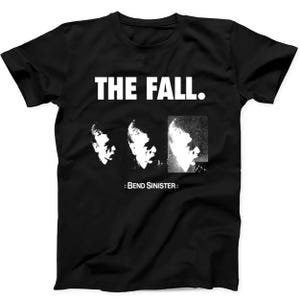 May include: Black t-shirt with a white graphic. The design features the text "THE FALL." above three stylized black and white portraits and the text ": BEND SINISTER:" below.