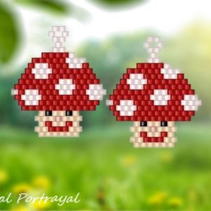 Puede incluir: Dos dijes con forma de hongo hechos de peque&ntilde;as cuentas cuadradas. Cada hongo presenta un sombrero rojo con puntos blancos, un tallo beige y una cara sonriente con ojos negros y boca roja. Un peque&ntilde;o lazo blanco est&aacute; unido a la parte superior de cada sombrero.