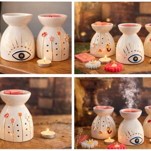 May include: Three white ceramic wax warmers with a flared top and rounded base. One features a gold-painted eye design, while the others have gold-stemmed floral motifs and small circular cutouts. Each includes a small tea light candle for heating.