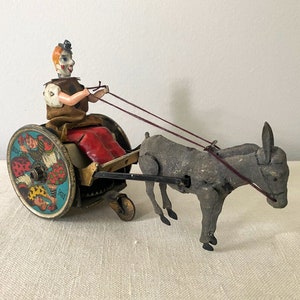 antique, toy, vintage, german, germany, lehman, wind-up toy, balky mule with cart, early 1900s, clown, tin clown, tin toy, circus, donkey, moving toy, tin litho, nursery decor, collectible