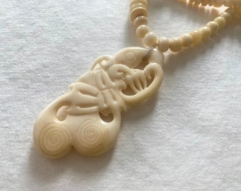 Maori Pendant Necklace, Vintage Carved Bone Manaia Pendant and Long Beaded Necklace from New Zealand