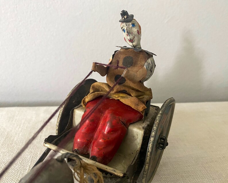 antique, toy, vintage, german, germany, lehman, wind-up toy, balky mule with cart, early 1900s, clown, tin clown, tin toy, circus, donkey, moving toy, tin litho, nursery decor, collectible