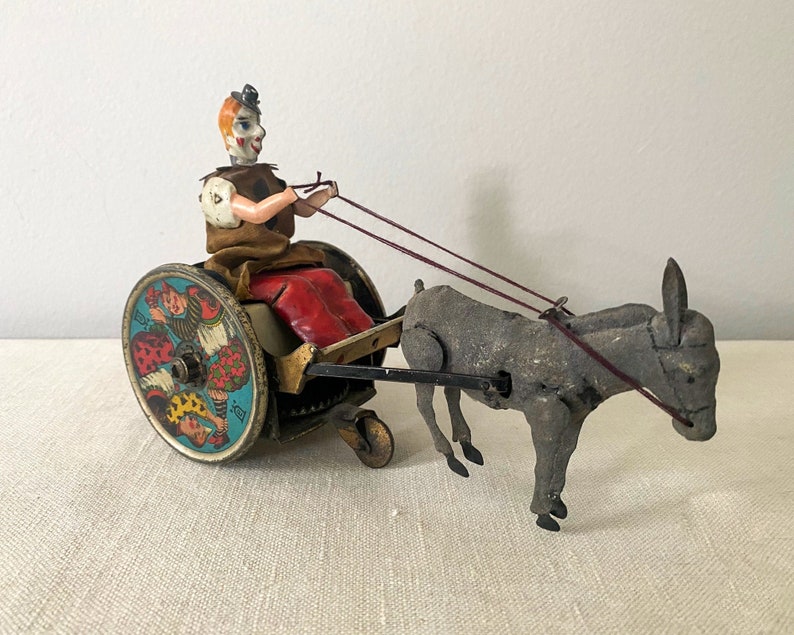 antique, toy, vintage, german, germany, lehman, wind-up toy, balky mule with cart, early 1900s, clown, tin clown, tin toy, circus, donkey, moving toy, tin litho, nursery decor, collectible