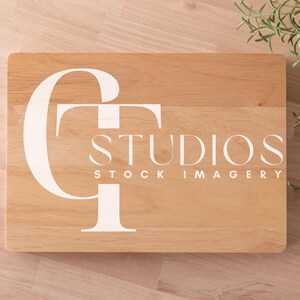 May include: A light brown wooden sign with the text "GT Studios Stock Imagery" in white lettering.