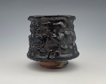 Guinomi, wood-fired iron rich stoneware with a black shino type glaze