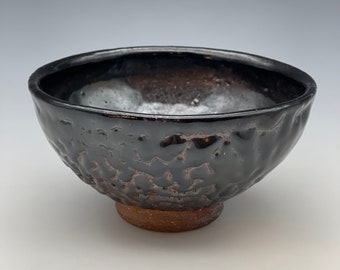 Chawan, wood-fired iron rich stoneware with a black shino and natural ash glaze