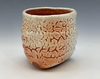 Teacup, wood-fired iron rich stoneware with crawling shino and natural ash glazes