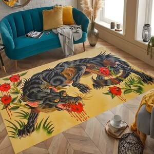 May include: A yellow and black rug with a graphic design of a snarling wolf with red roses and dripping blood. The wolf is in a traditional tattoo style.