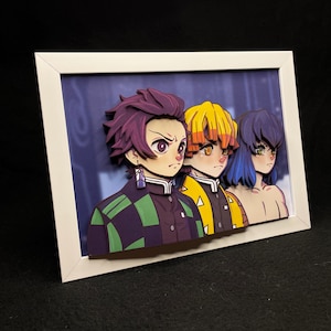 May include: A framed 3D art print featuring three anime characters. The characters are depicted in a close-up view, with their faces and upper bodies visible. The character on the left has purple hair and is wearing a green and black patterned shirt. The character in the middle has yellow hair and is wearing a yellow shirt with a black pattern. The character on the right has blue hair and is wearing a white shirt.