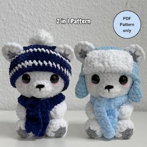 May include: Two crocheted polar bear amigurumi toys wearing winter hats and scarves. The bear on the left has a blue and white striped hat and a blue scarf. The bear on the right has a light blue hat and a light blue scarf. The text "2 in 1 Pattern" is above the bears. The text "PDF Pattern only" is in a circle in the upper right corner.