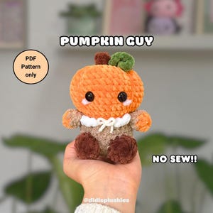 May include: A crocheted pumpkin toy in orange, brown, and green, with black button eyes and a white collar. The text "PUMPKIN GUY" and "NO SEW!!" are visible. The product is a PDF pattern.