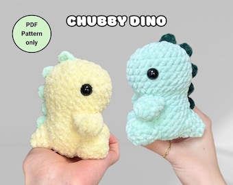 May include: Two crocheted dinosaur plushies, one yellow and one light blue, with black eyes. The plushies are sitting on hands. The text "CHUBBY DINO" is above the plushies. The text "PDF Pattern only" is in a green circle in the top left corner of the image.